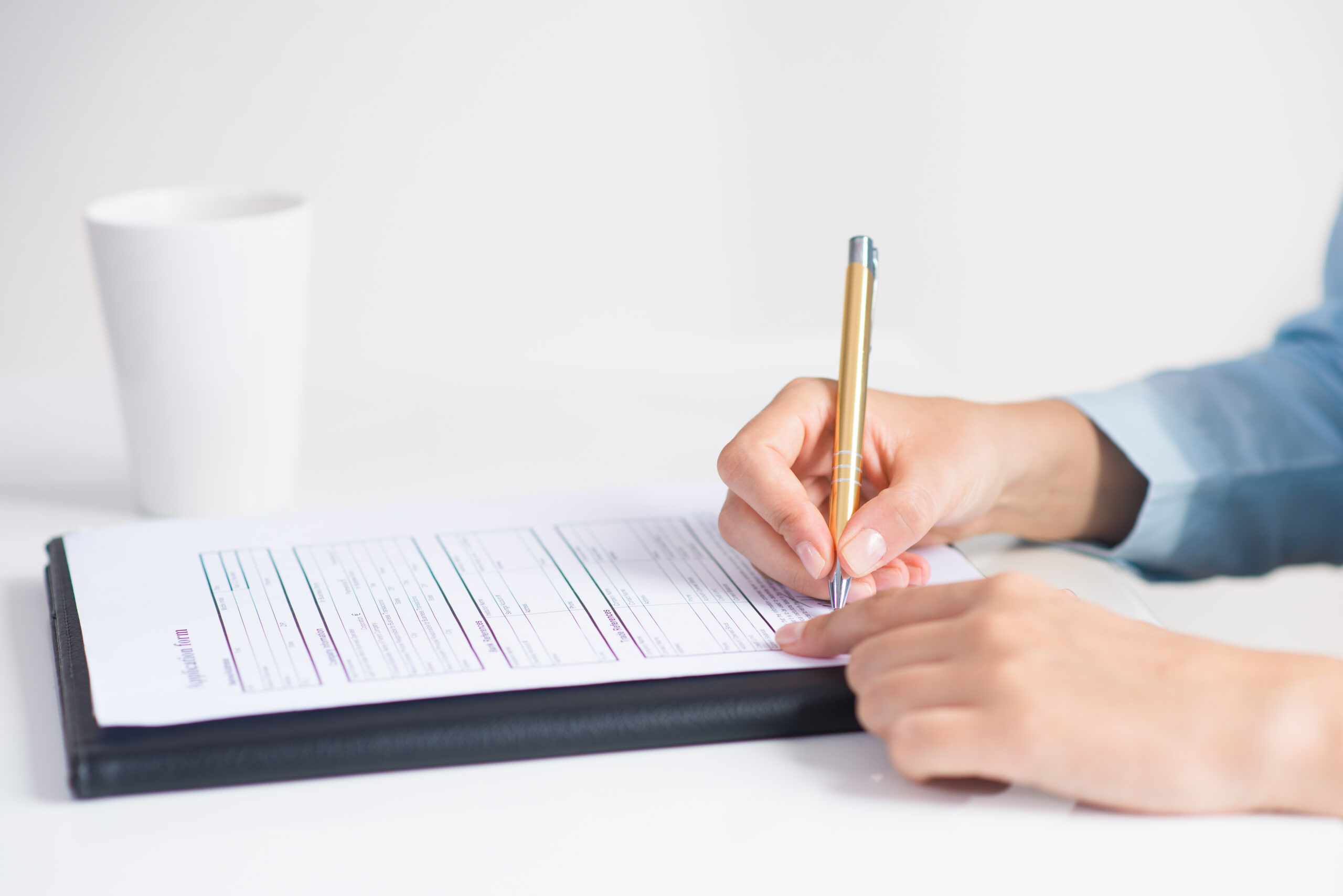 Closeup of candidate signing application form